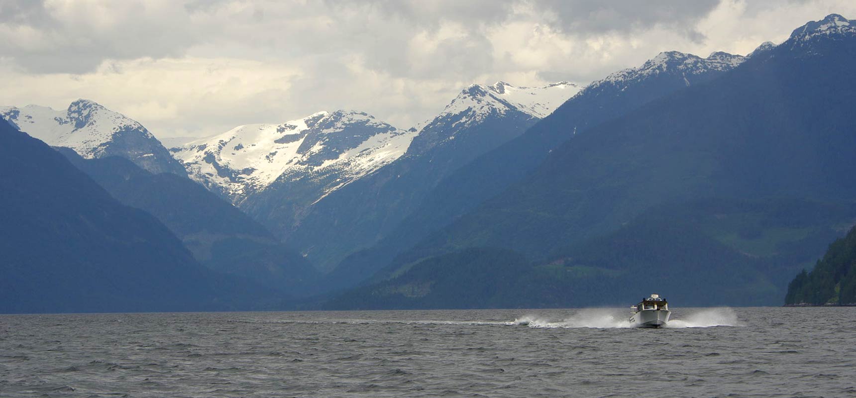 Tour boat slices through waters of upper Jervis Inlet